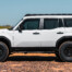 2024 Toyota Land Cruiser LC250 Modular Roof Rack by Westcott Designs. White LC250 Profile View.