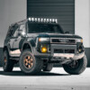 2024-2025 Toyota Land Cruiser LC250 Westcott Designs Roof Rack with 10-Light Rigid Industries 4" 360 RGBW Lights-3/4 Full Truck Pic