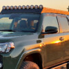 2010-2024 Toyota 4Runner (5th Gen) Full-Length Modular Roof Rack by Westcott Designs Showing the 10 Light Cut-Out Visor_Lifestyle 1